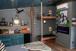 ouble bunks. Crank up the bottom bunk to reveal a table with seating for 2.