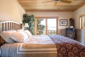 First primary suite with King pillow top mattress, fireplace, and views!  Full bathroom en suite