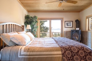 First primary suite with King pillow top mattress, fireplace, and views! Full bathroom en suite