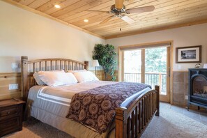 First primary suite with King pillow top mattress, fireplace, and views! Full bathroom en suite
