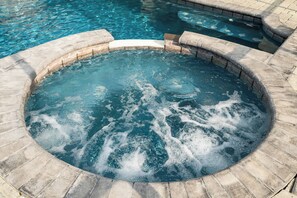 Imagine soaking in this bubbling spa after a long day in the parks.