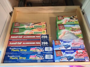 kitchen is fully loaded, down to spices and zip lock bags