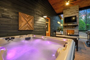 Catch your favorite shows while soaking in the hot tub.