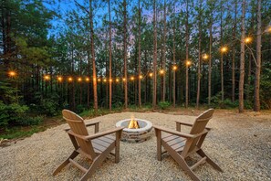 Reconnect around the fire pit while star gazing.