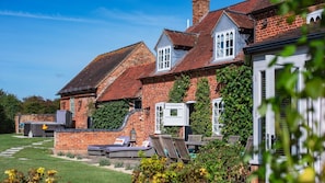 Terrace and hot tub, Beecham Farmhouse, Bolthole Retreats