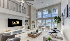 Open Layout Family Area overlooking Waterway & Pool Area