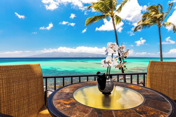 Enjoy panoramic ocean views and magical Maui sunsets from your private lanai