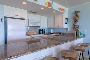 Seating for 10 counter stools and dining table
