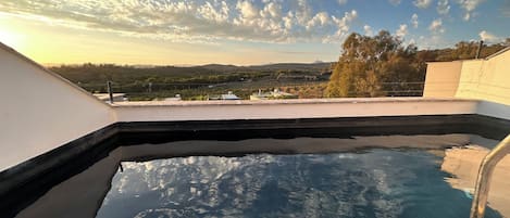 The rooftop pool is fantastic at any time of day, including sunset. 