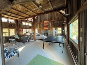 OG 1850s barn game room w/ ping pong, foosball, 52 in TV, & 2  seating areas