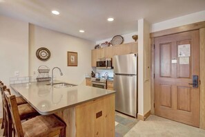 Kitchen in a one bedroom at The Springs