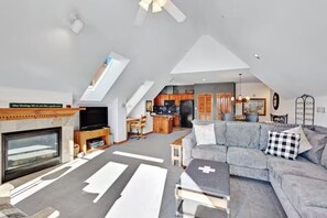 Modern fireplace in this bright space