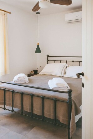 Experience the comfort of a cozy double bed, providing an inviting haven for relaxation