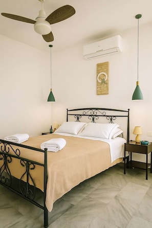 Relax in the inviting bedroom, where comfort and tranquility come together