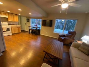 Living room area connected to kitchen