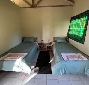 Twin beds in Garden Cottage bedroom. Bedroom #4