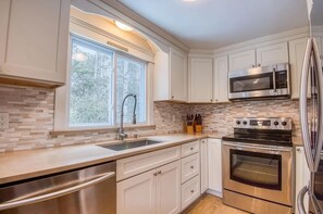 Upper level well-stocked kitchen