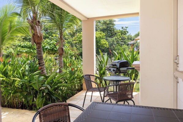 Outdoor dining areas with a BBQ are provided exclusively for the guests staying in the unit

