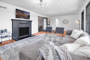 Comfy living room for movie night.
The fireplace is to not be utilized.