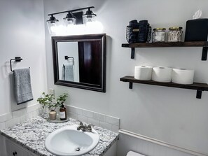 The Beautifully-Appointed Bathroom has All of the Necessities You May Need
