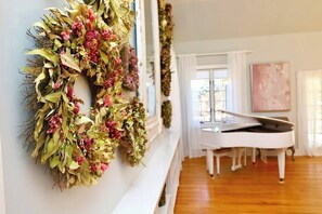 A beautiful baby grand piano is provided for you to play to your heart's content!
