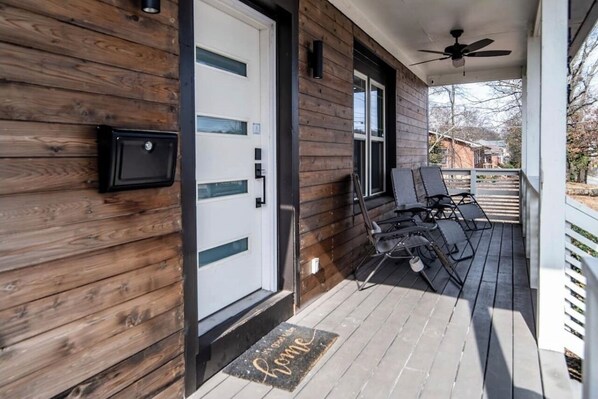 Front porch with seating to enjoy your morning cup of joe and a beautiful view.