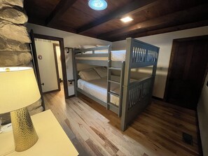 bedroom 3 with queen size bunkbed and closet