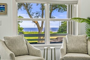 Enjoy the gorgeous view from swivel rockers in the living room.