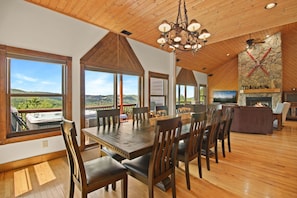 Dining room with seating for 10 and 4 bar stools.