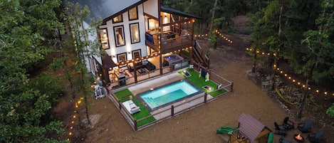 This cabin has it all! Heated Pool, Pool Table, Playset