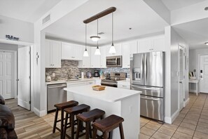 Full Size Kitchen with Ocean Views and Island Bar Seating