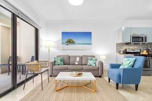 Step into comfort as you enter our inviting living room – your tranquil escape.