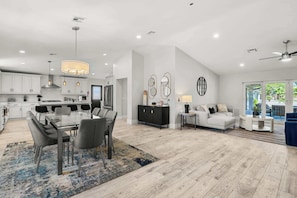 Spacious, open floor plan and entertaining area overlooking the beautiful back yard oasis.
