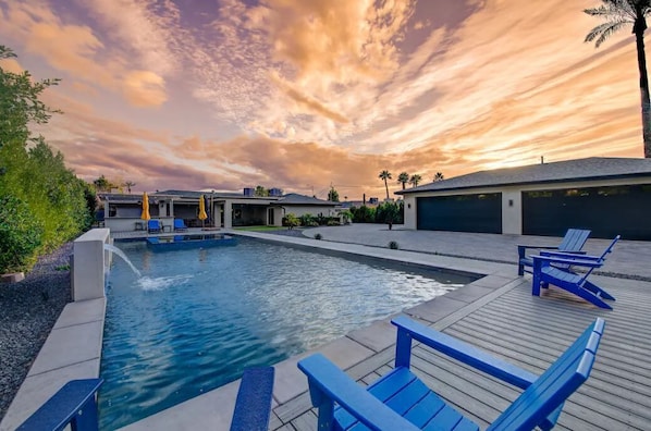 Stunning resort style, private back yard with a heated salt water pool (by request), tranquil water feature and infinity edge spa. This sprawling back yard oasis also offers a basketball/pickleball court, brand new air conditioned game room.