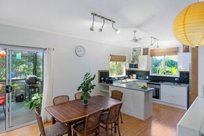 Every room has views over the garden, including the modern kitchen.