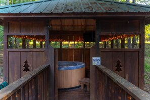 Cafe lights in the hot tub room add a finishing touch of ambience to the outdoor hot tub experience. 