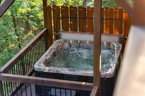 The private hot tub is one of our favorite spaces on property! It sits among the trees and lets you enjoy the moment in seclusion. 