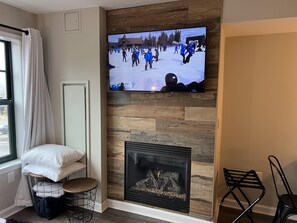 With a flip of a switch this unique gas fireplace will warm your hearts on a cold winters night