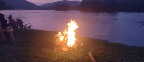 Evening bonfire riverside