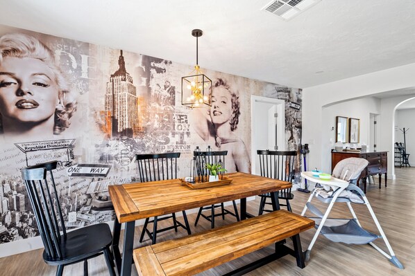 Dine in style with bold Marilyn art and a table set for fun and conversation.