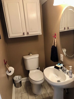 Off of the kitchen is a full bath and laundry room.