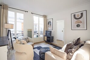 Salon avec canapé lit 