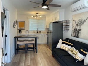 View of living room looking into the kitchen/dining area