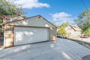 2 car garage behind property accessed by street through alley.