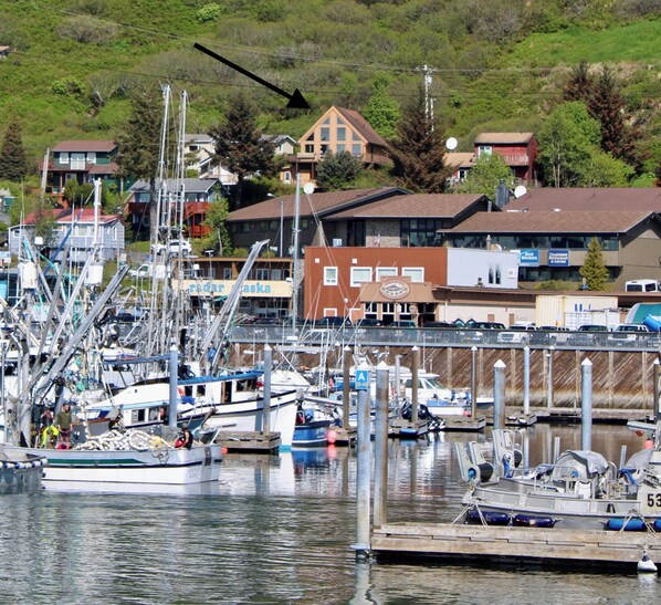 The view of the house from the main harbor in town. Charming A-framed house. 