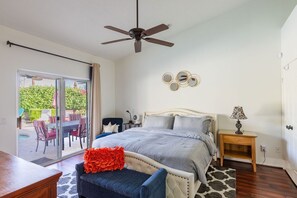 Master bedroom with sliding doors to the pool and spa