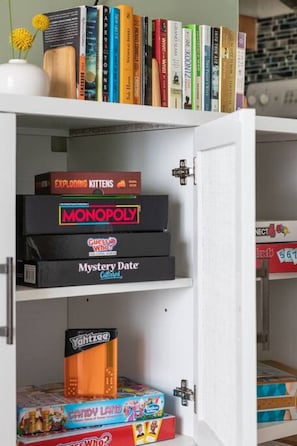 Books and games stored in the living room