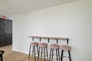 Dining area with bar stools to seat 4.