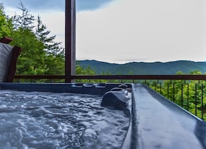 Soak in the mountain views with the hot tub jets!