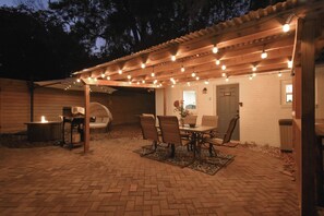 Well- lit outdoor area with firepit, grill and outdoor games!